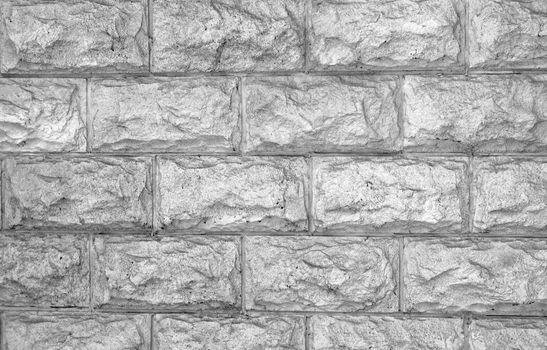 The wall of the large rectangular stones monochrome toned  as a background