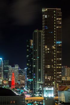 Aerial view of the downtown area of Miami, Florida, showing the colorful skyscrapers and densely packed buildings