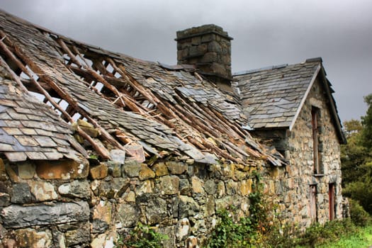 an old ruined stone barn in the rural countryside