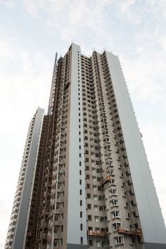 one tall building under construction,low angle