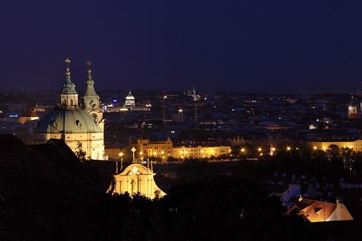 Photo shows details of Prague city at night.