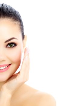 Cheerful female with fresh clear skin, white background