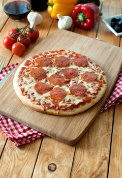 Delicious Italian pizza with melted mozzarella cheese 