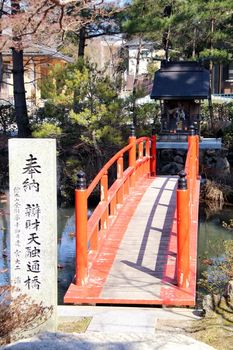 Photo shows details of old Japanese temple bridge.