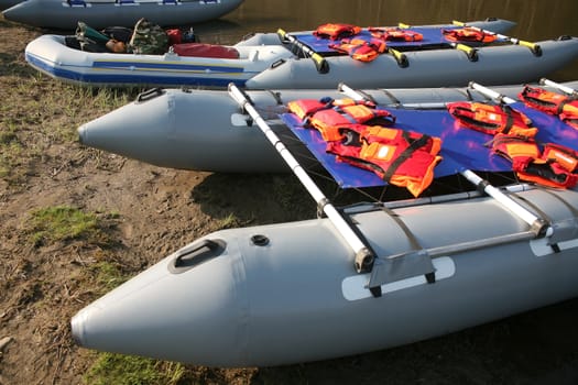 Catamarans inflatable for rafting on river bank