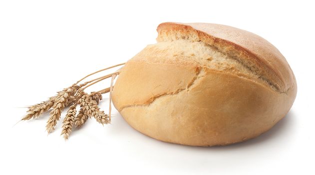 Ukrainian round bread with wisp of wheat on the white background