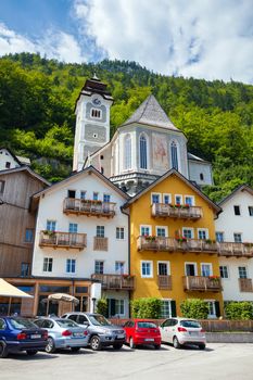 Hallstatt, Austria - August 7, 2013: Village square with typical colorful houses in Hallstatt, Austria
