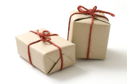 two craft cardboard gift boxes on a white background