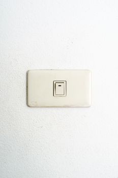electric white switch on wall