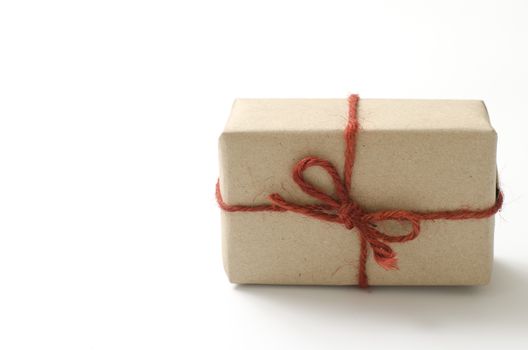 single craft cardboard gift box on a white background