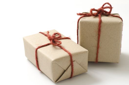 two craft cardboard gift boxes on a white background