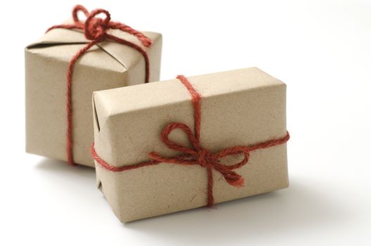 two craft cardboard gift boxes on a white background