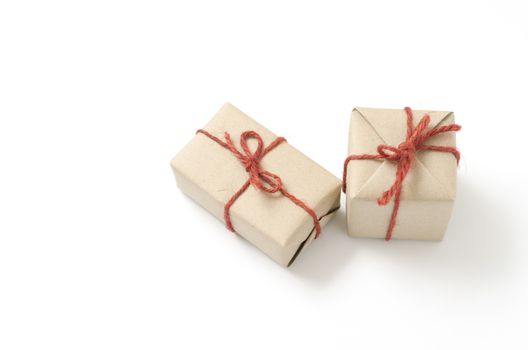 two craft cardboard gift boxes on a white background