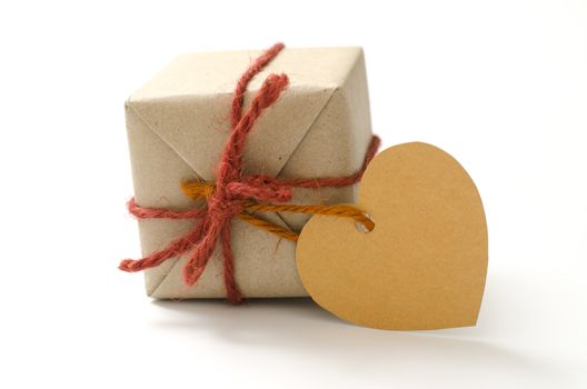 heart tag with single craft cardboard gift box on a white background