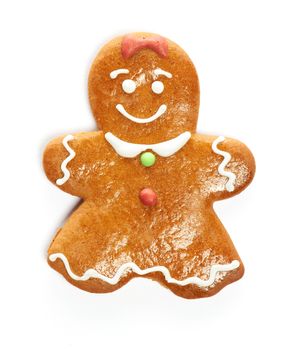 Christmas gingerbread girl cookie isolated on white