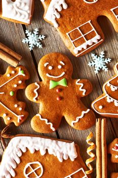 Christmas homemade gingerbread cookies on wooden table