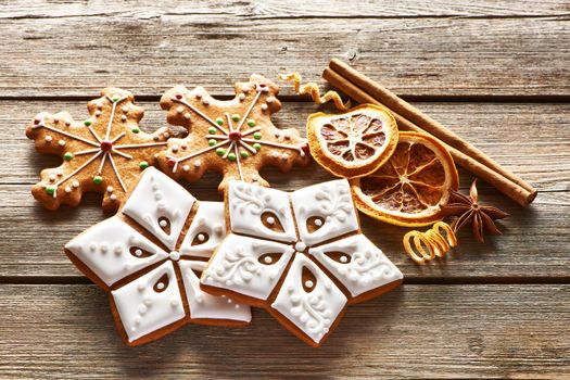 Christmas homemade gingerbread cookies on wooden table