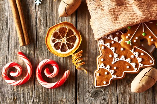 Christmas homemade gingerbread cookies on wooden table