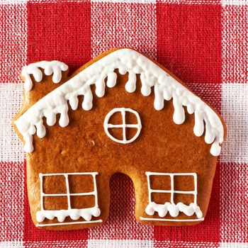 Christmas homemade gingerbread cookie on tablecloth