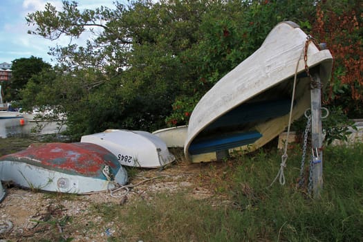Dinghies, stored on dry land waiting for use