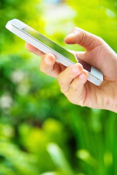 Woman hand holding a Smart Phone