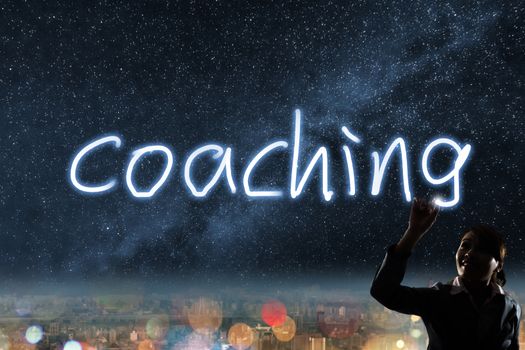 Concept of coaching, silhouette asian business woman light drawing.