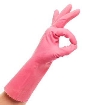 Hand in a pink glove on a white background
