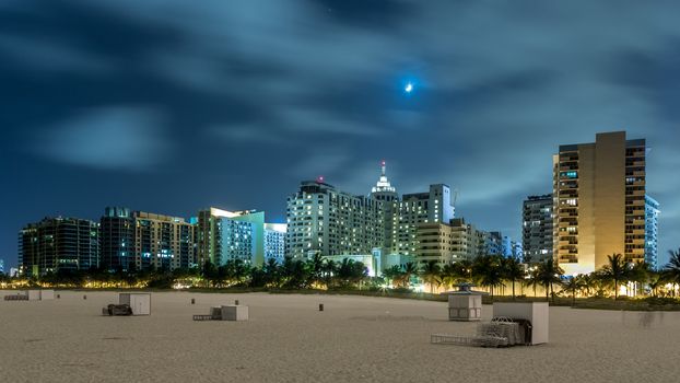 Miami beach unusually empty and quite, and only accompanied by the multi-story buildings in the background