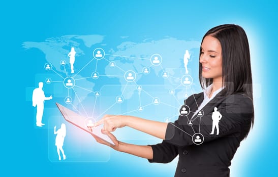 Beautiful businesswomen in suit using digital tablet. Silhouettes of business people and network