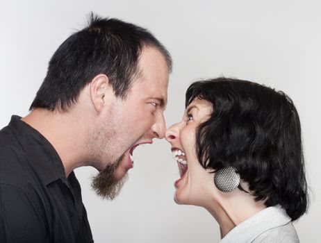 couple fighting, yelling at each other - isolated on white