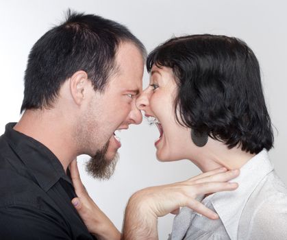 couple fighting, yelling at each other - isolated on white