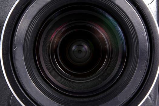 A background with a closeup view of a digital camera lens