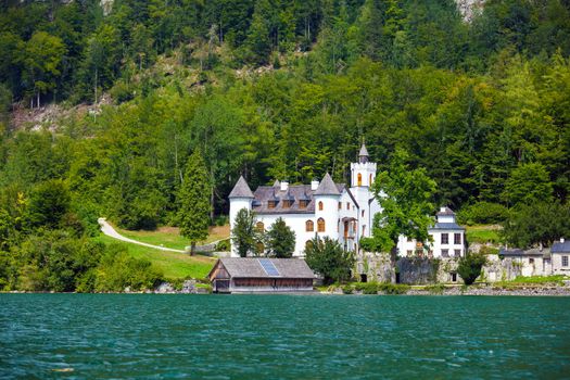 Hallstatt, Austria - August 7, 2013: Castle on Hallstatt lake shore, Austria