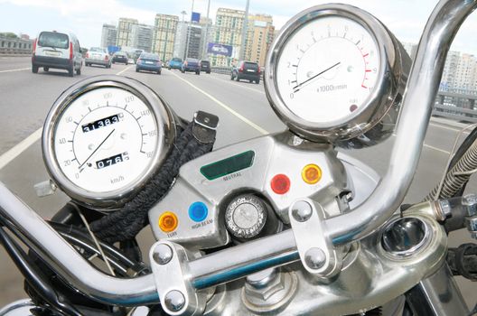 Forward part of motorcycle with speedometer and tachometre