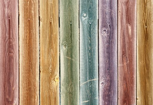Background of multi-coloured vertical wooden boards