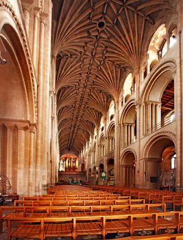 This view of the nave of the 900 year old Norwich cathedral shows some of the wonderful architecture, and splendid vaulted ceiling. 
