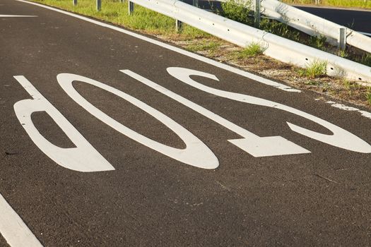 Stop sign painted on the road