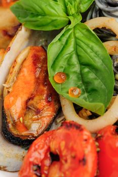 Black Pasta with Calamari Rings, Mussels, Shrimps and Basil