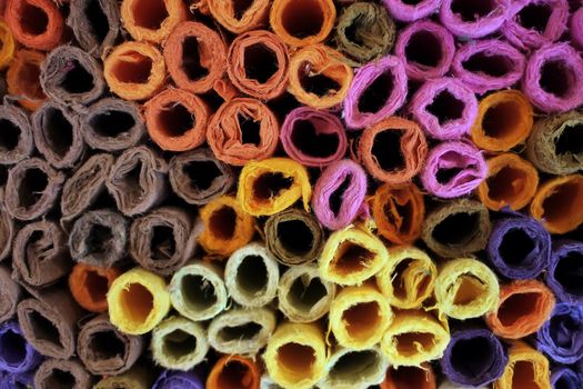 rolls of colorful wrapping paper as background   