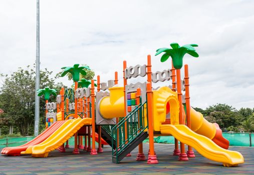 Colorful playground fun red day ice set joy kid cold baby park blue play game slide green place color climb empty child happy nobody season ladder nature ground outdoor