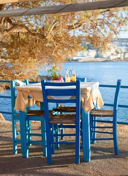 Typical table with chairs of outdoor greek cafe