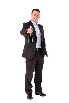 Businessman in a suit holding sparkling wine bottle. Isolated with work path.