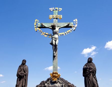 czech republic prague charles bridge - statue of jesus christ on cross