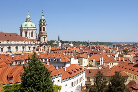 czech republic, prague - st. nicholas church at roofs of little quarter (mala strana)