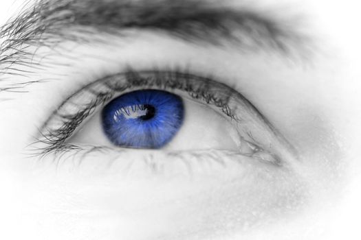 Close up photo of a beautiful young man's eyes