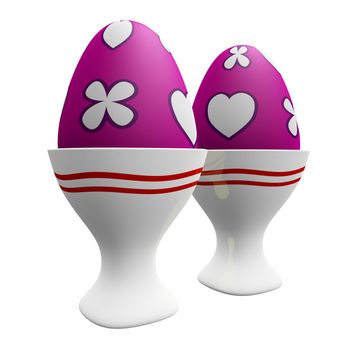 Two pink painted Easter eggs, with floral design, in white ceramic egg cups, isolated on white. 
