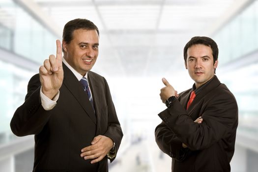 two young business men portrait at the office