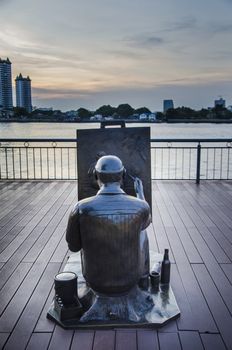 BANGKOK - 6 April :Artist Statue in Asiatique The Riverfront, an expansive open-air mall with river views and 'festival market and living museum' concept. on April 6, 2014 in Bangkok, Thailand