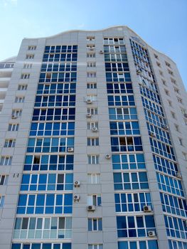 multistorey modern house on the blue sky background