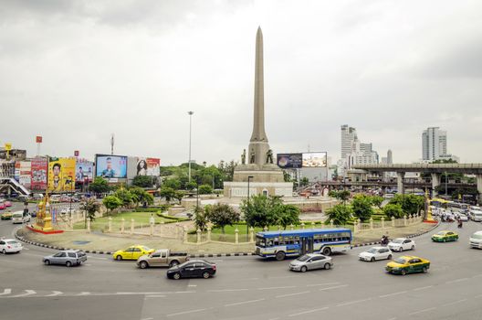 BANGKOK - Traffic At Victory Monument Of Thailand on August 2 2014, in Bangkok thailand. The monument is located in Ratchathewi District, northeast of central Bangkok.